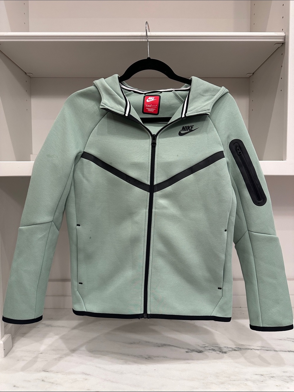 Nike Kids size large Mint Green Hooded Zip Jacket with Black Trim. Like new